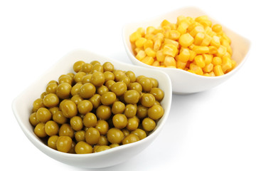 Canned Corn and Canned Green Peas. Isolated with clipping path.