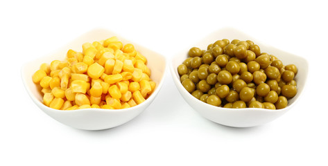 Canned Corn and Canned Green Peas. Isolated with clipping path.