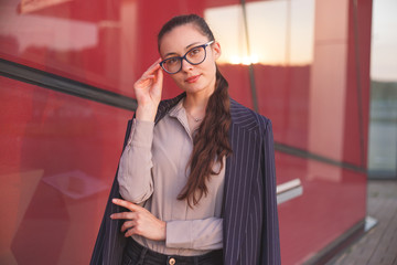 Portrait of short-sighted woman in new eyeglasses