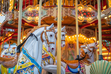 Fototapeta na wymiar old fairground carousel horses