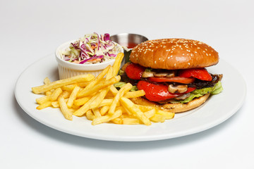 vegetarian burger with a potatoes and salad