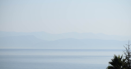 mountains in the mist over the sea