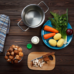 Ingredients for grandma's mushroom soup with croutons  close-up on the table.
