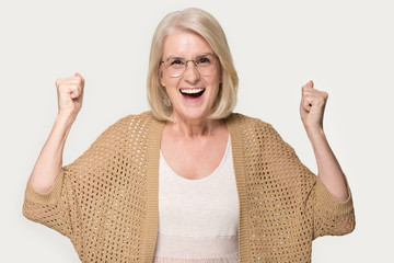 Overjoyed mature woman feel euphoric with good news