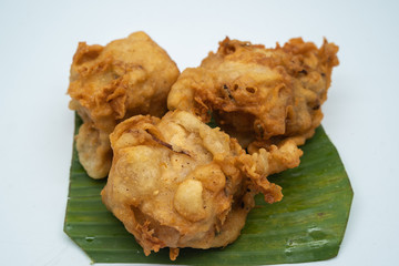 Fried tofu with vegetable stuffing, popular type of snack in southeast asia especially Indonesia and Malaysia, known locally as tahu isi. Shot isolated on white background