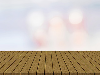 Empty wooden table  with blurred light bokeh background