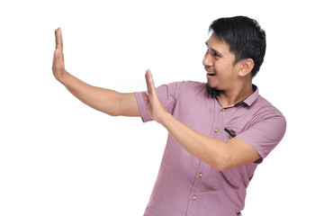 Handsome young Asian man denying, rejecting proposition, refusing bad deal offer, disagree with...