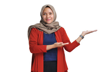 Beautiful Asian woman wearing hijab presenting blank area copy space