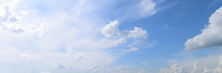 Clouds in the blue sky. The nature of the earth, atmospheric phenomena, its natural manifestations,panorama.