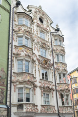 Vertical view of historic architecture at the town square in the old part of the city of Innsbruck, Austria