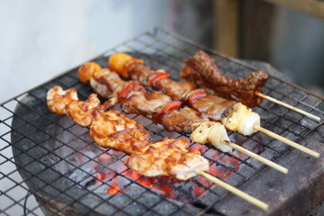 closeup​ BBQ.​ BBQ on the charcoal stove.