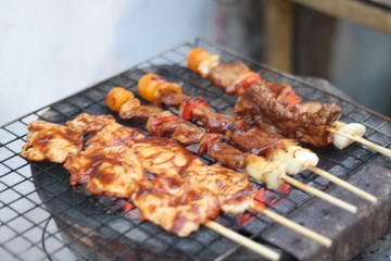 closeup​ BBQ.​ BBQ on the charcoal stove.