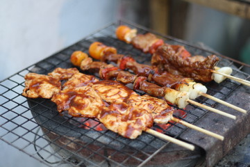 closeup​ BBQ.​ BBQ on the charcoal stove.