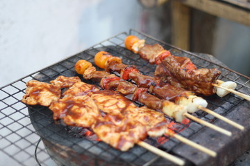 closeup​ BBQ.​ BBQ on the charcoal stove.