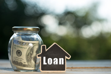 Loan written on the little house shape tag - real estate concept