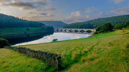 Early morning light on the Lady Bower Reservoir and Snake Road Bridge, Peak District, UK