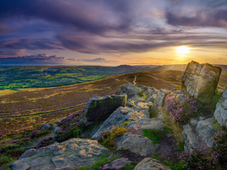 Heather and sunset over the Hope Valley from Win Hill in the Peak District National Park