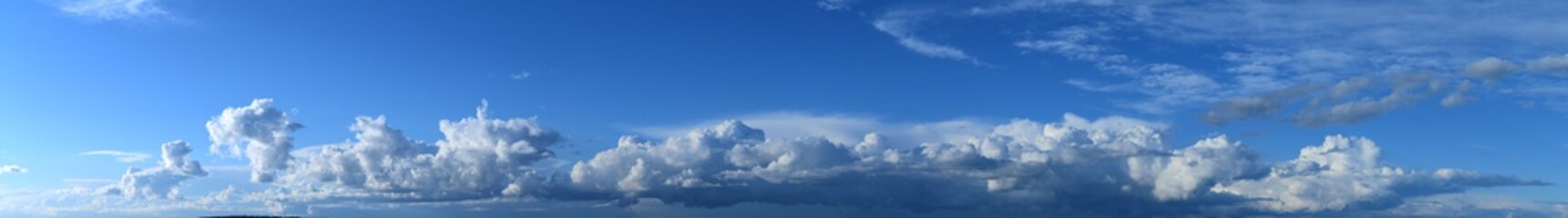 Photo of the cloudy sky. Horizon, moisture-bearing and vapor-forming atmospheric phenomenon, panoramic image.