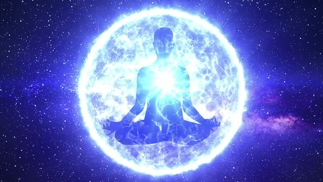 Silhouette of man doing yoga meditation enveloped in a sphere of energy or aura light with the heart chakra illuminated. Concept of zen spirituality. Spiritual connection. Starry space background