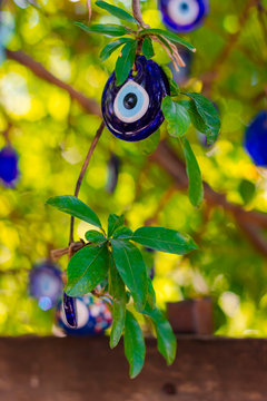 Multicolored nazar - evil eye amulets in store on the street