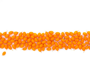 Sea buckthorn berries on a white background. Composition of berries. Strip.