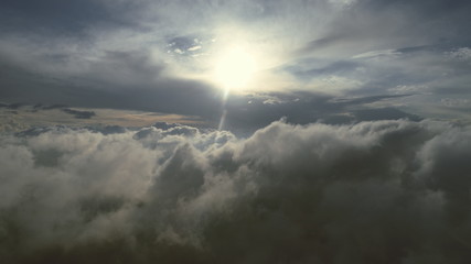 Obraz premium aerial fly above clouds with blue sky in backgroubnd on beautiful sunny day