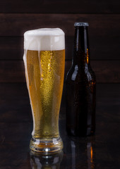 Glass of Cold Beer and Bottle