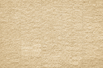 Fototapeta na wymiar Granite tiled wall background rough texture in natural light yellow cream color