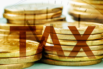 Gold coins tax concept with clock