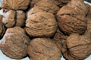 A group of big, fresh and healthy wallnuts closeup 