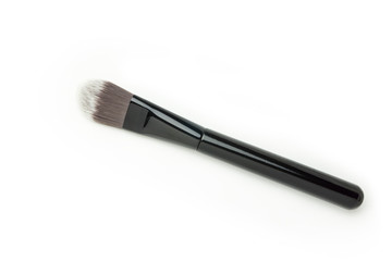 makeup tool brush , false eye lashes on white background 
