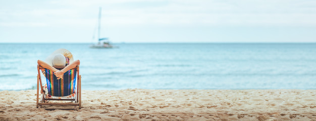Woman on beach in summer © Peera