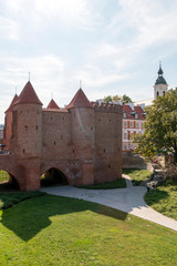 Fototapeta na wymiar The Barbican and City Walls in Old Town of Warsaw, Poland