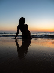 Fototapeta premium woman sunbathing on the tropical beach