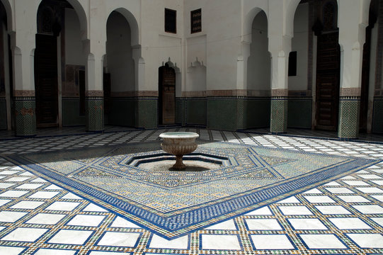 Marrakesh Morocco, interior courtyard with fountain and zellige tiled floor at Dar Si Said 