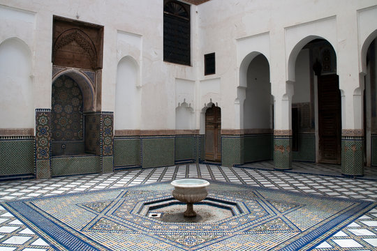 Marrakesh Morocco, interior courtyard with fountain and zellige tiled floor at Dar Si Said 