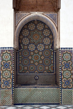 Marrakesh Morocco,  zellige tiled water fountain with abstract flower patterns