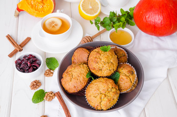 spiced pumpkin muffins with walnuts and cranberries