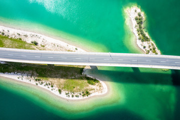Obraz premium Sylvenstein Lake Bavaria Germany. Bridge for cars over water. Aerial View