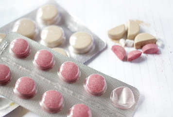 Pills and Blister Pack.  Painkillers and drug abuse. Colored pills. Natural medicine. Medical supplies. Close up, Cover photo