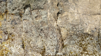 Naklejka premium Old gray stone texture with cracks and scratches