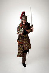 Fototapeta premium Adult male wearing very old armor.