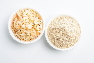 Dried seafood white shrimp and shrimp skin powder on white background