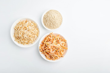Dried seafood white shrimp and shrimp skin powder on white background