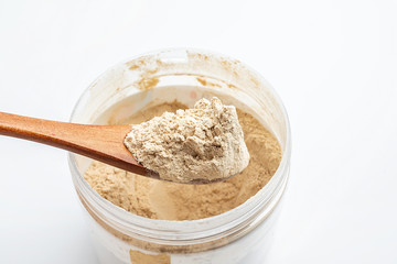 a spoonful of nutritious shrimp skin powder close-up