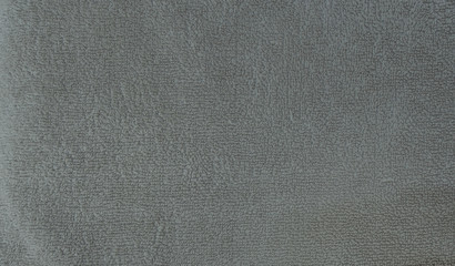Fototapeta na wymiar Texture of micro fiber, cotton, white bath towel with wrinkles. Backgrounds and textures