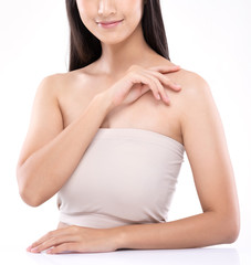 Fototapeta premium Beautiful Young Asian Woman Looking While Touching Shoulder feeling so happy and cheerful with healthy Clean and Fresh skin,isolated on white background,Beauty Cosmetology Concept