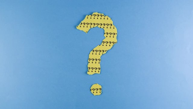 Stop motion - Footage of a moving question mark made from torn paper on a blue background. Concept of questions, quiz, riddle, faq, uncertainty and background. 4K mp4 high quality