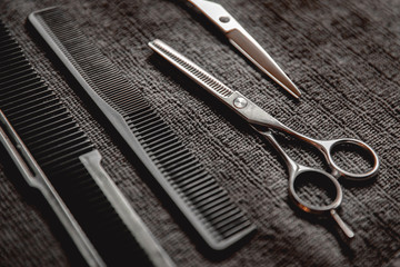 Barbershop background for men beauty salon, hairdresser tools scissors and comb, copy space