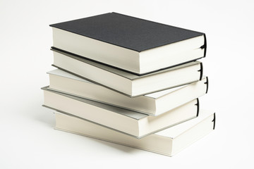A Disarrayed Stack OF Cloth Bound Books